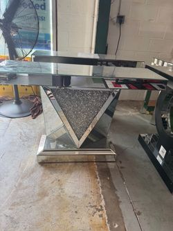 Brand new mirrored console.