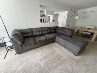 Gray sectional sofa with right facing chaise