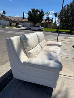 Free faux cream leather sofa