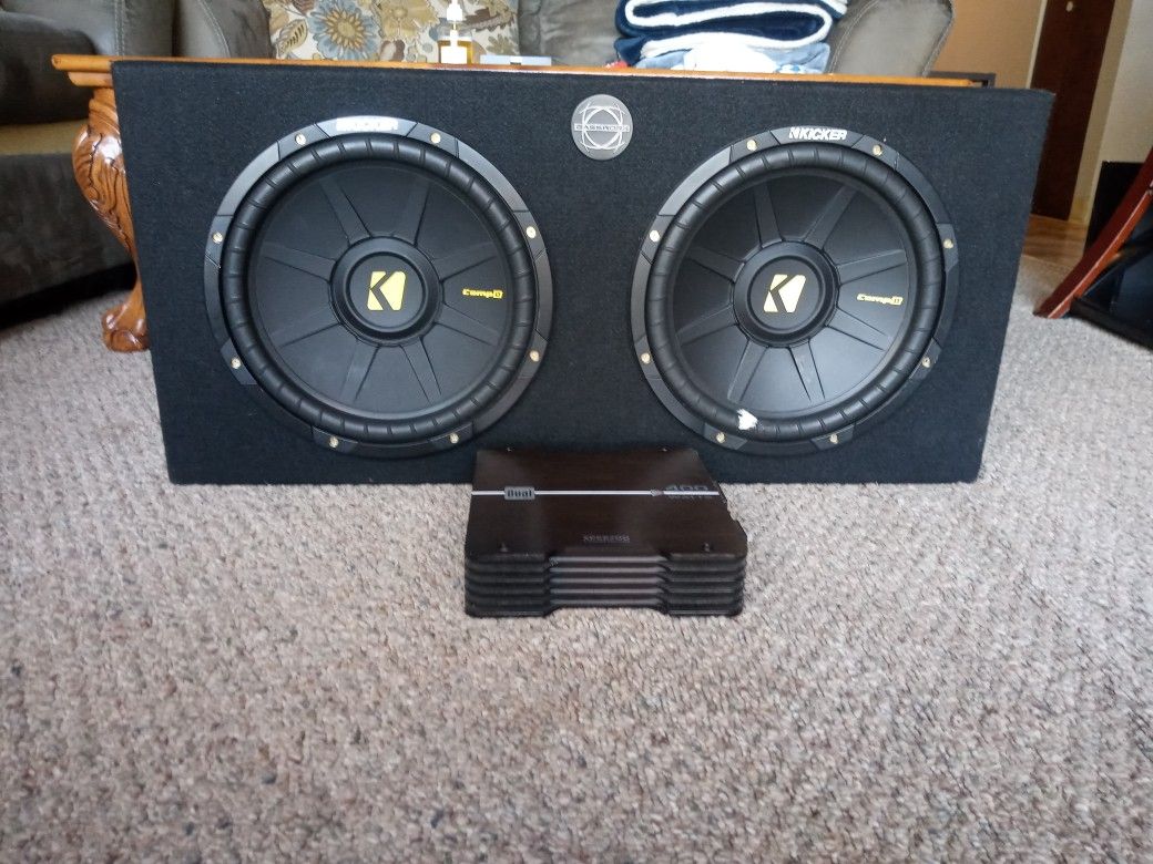 Kicker brand comp d 10" dual subs. Enclosed w/400 watt amplifier.