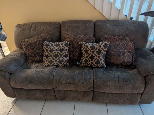 Reclining couch, gliding/reclining love seat, and reclining rocking chair