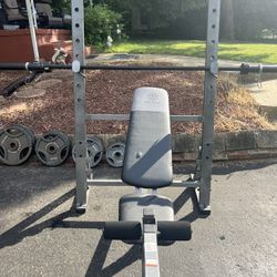 Weight bench with weight set and barbell