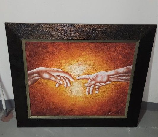 reproduction of Michelangelo's fresco, "The Creation of Adam.