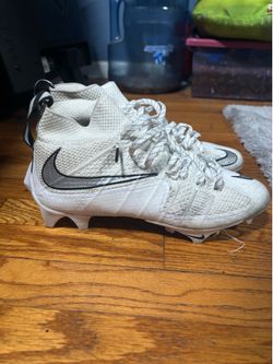 2 pairs of  Nike football cleats size 8.5