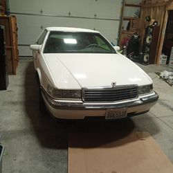 I Got A 1994 Cadillac Eldorado Coupe It's Got 131,000 Mi Plus Not Too Much More The Bodies In Nearly Good Condition It's In Driving And Handles Great 