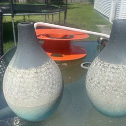 teardrop-shaped textured glass vases.