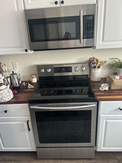 Samsung Stainless Steel Electric Range and Microwave Set