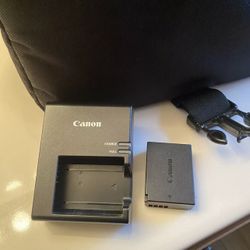 Canon EOS Rebel T5 with 18-55 Lens, Case, And Charger! Works Great!