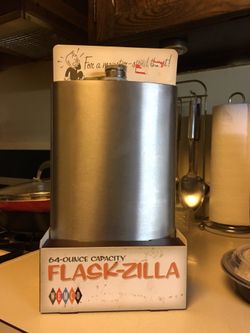 Flask. 64 oz capacity