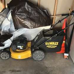 DeWalt Lawn Mower. Used Less Than 5 Times. Moved Out The House And Into An Apartment. 