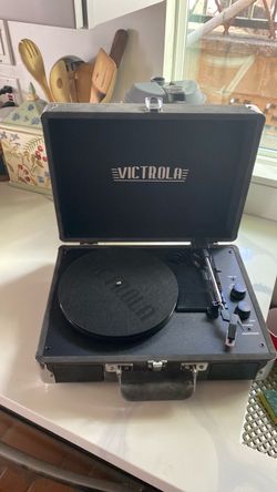 Victrola Journey - Bluetooth Suitcase Record Player - Gray Built-in stereo speakers, 3-speed turntable plays 7", 10" and 12" records, Bluetooth stream