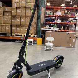 Electric scooters with front and rear shock absorbers