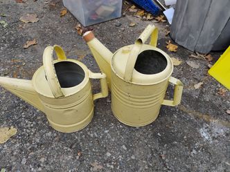 To antique galvanized watering cans