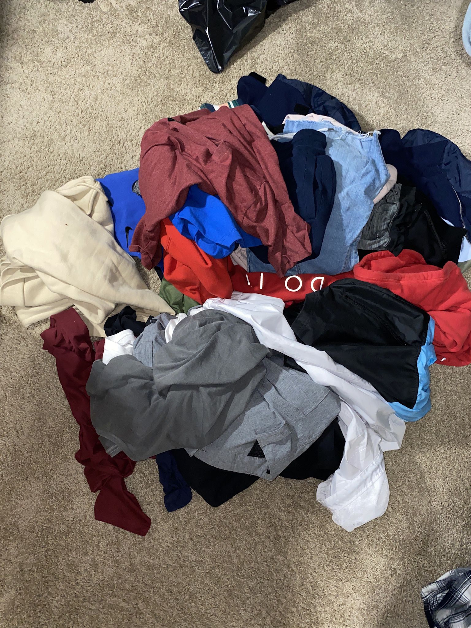 Pile of clothes-mix of long sleeves, hoodies, jackets, shorts, and short sleeves