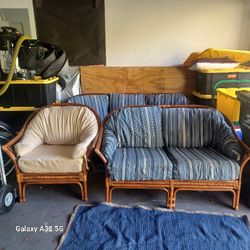 2 Rattan Couches With Cushions And A Large Overstuffed Rattan Chair