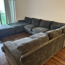 GRAY COUCH  WITH OTTOMAN 