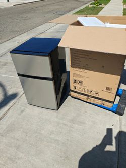3.1 mini fridge 2 door stainless 150 firm No Less brand new see pictures