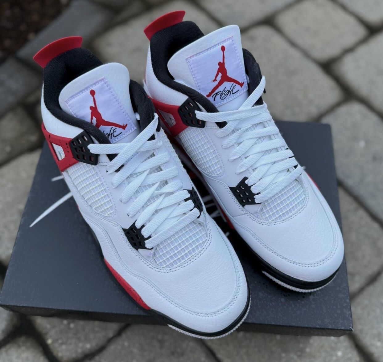 Jordan 4 (Red Cement)