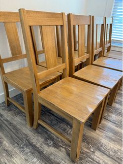 8 solid wood chairs great condition
