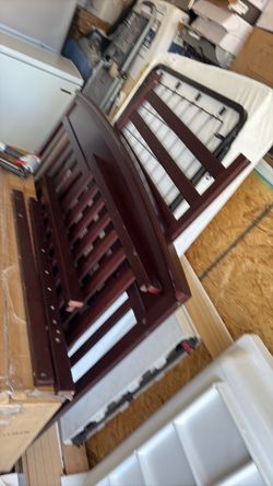 Baby crib with mattress.