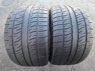 2 USED TIRES PIRELLI 295/40/22
