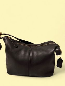 Black Coach leather shoulder bag with gold hardware