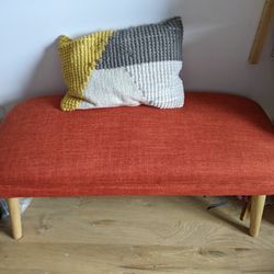 ORANGE FABRIC BENCH WITH WOODEN LEGS 