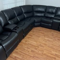 Winter clearance sale. Madrid black leather reclining sectional only $1399. Easy finance option. Same-day delivery.