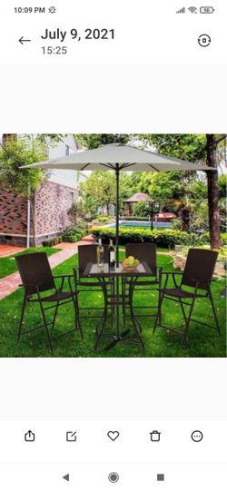 glass table and chairs set with rattan