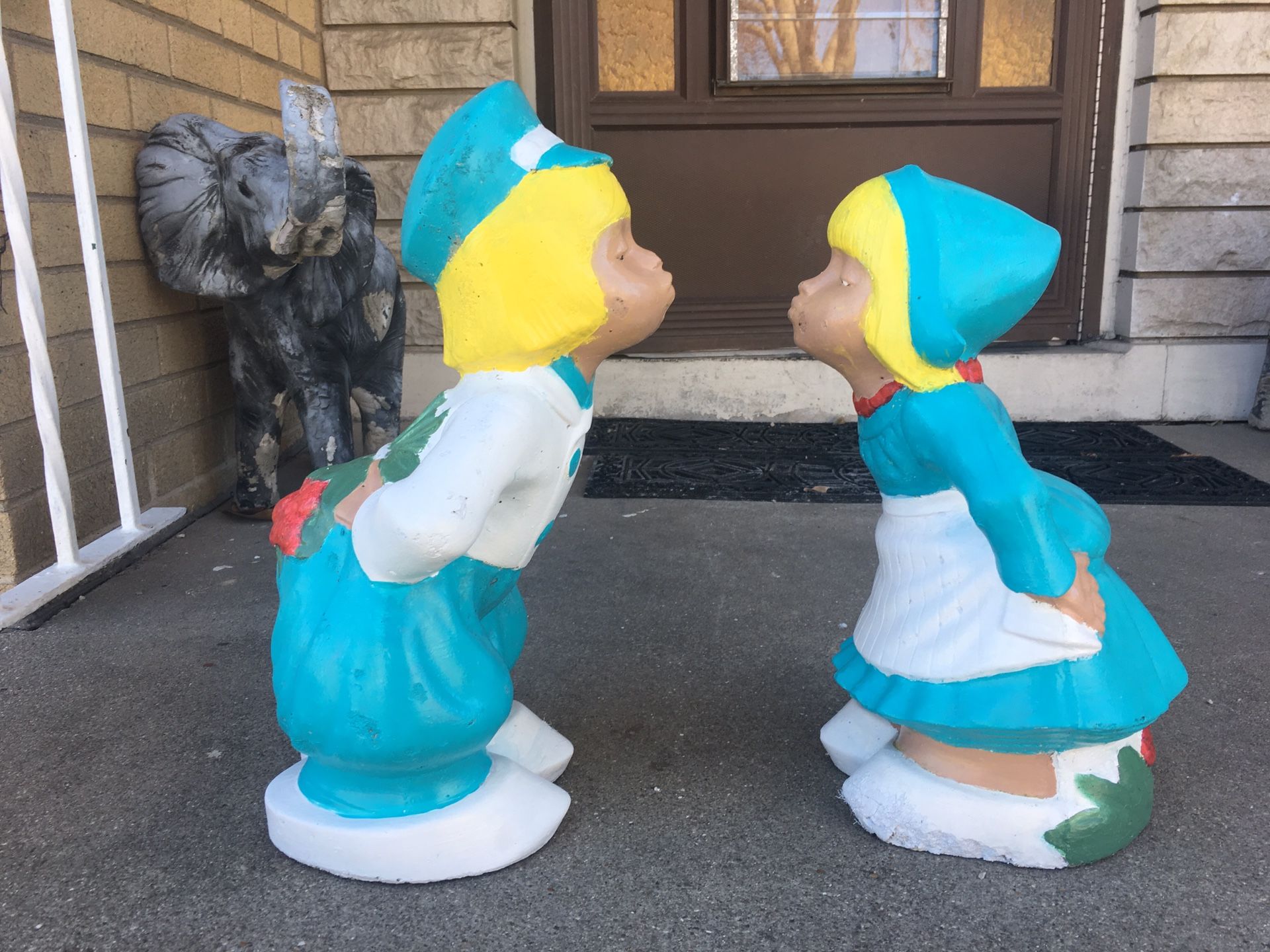 Vintage concrete Dutch boy & girl garden statues
