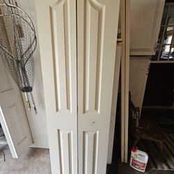 2 Bi-fold white closet doors OBO