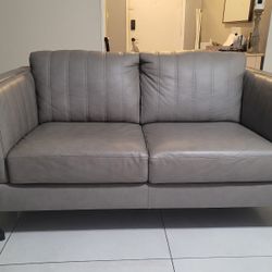 Leather Love Seat, Chair And Ottoman