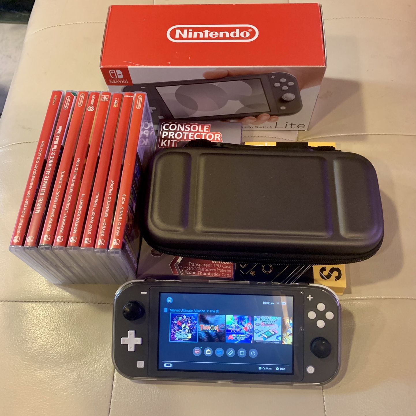 Grey Nintendo Switch Lite With Games And Extras $420