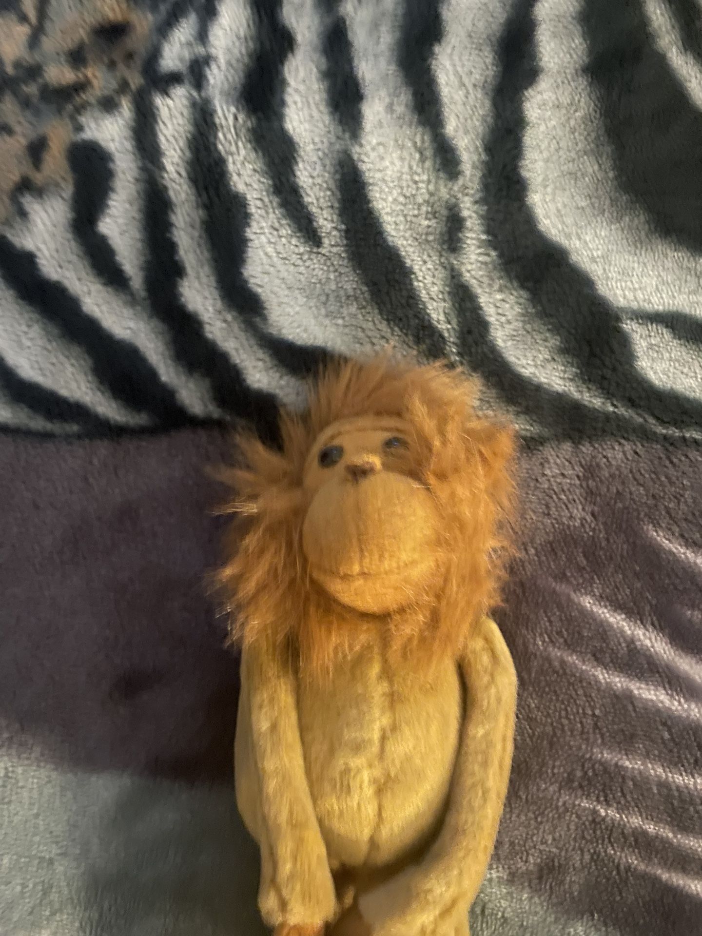 Monkey plush hands and feet can stick together is in good condition
