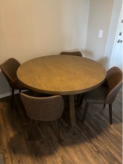 Round dining table and chairs