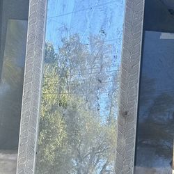 Decorative wooden framed plate glass mirror. 18” inches x 54” inches    $75