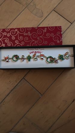 Vintage Christopher Radco presents, shiny bright charm bracelet, new unused