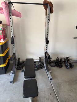 Barbell power rack with weights and bars