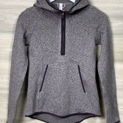 Lululemon Fleece & Thank You 1/2 zip pullover, likely in a heathered purple or mauve color. 