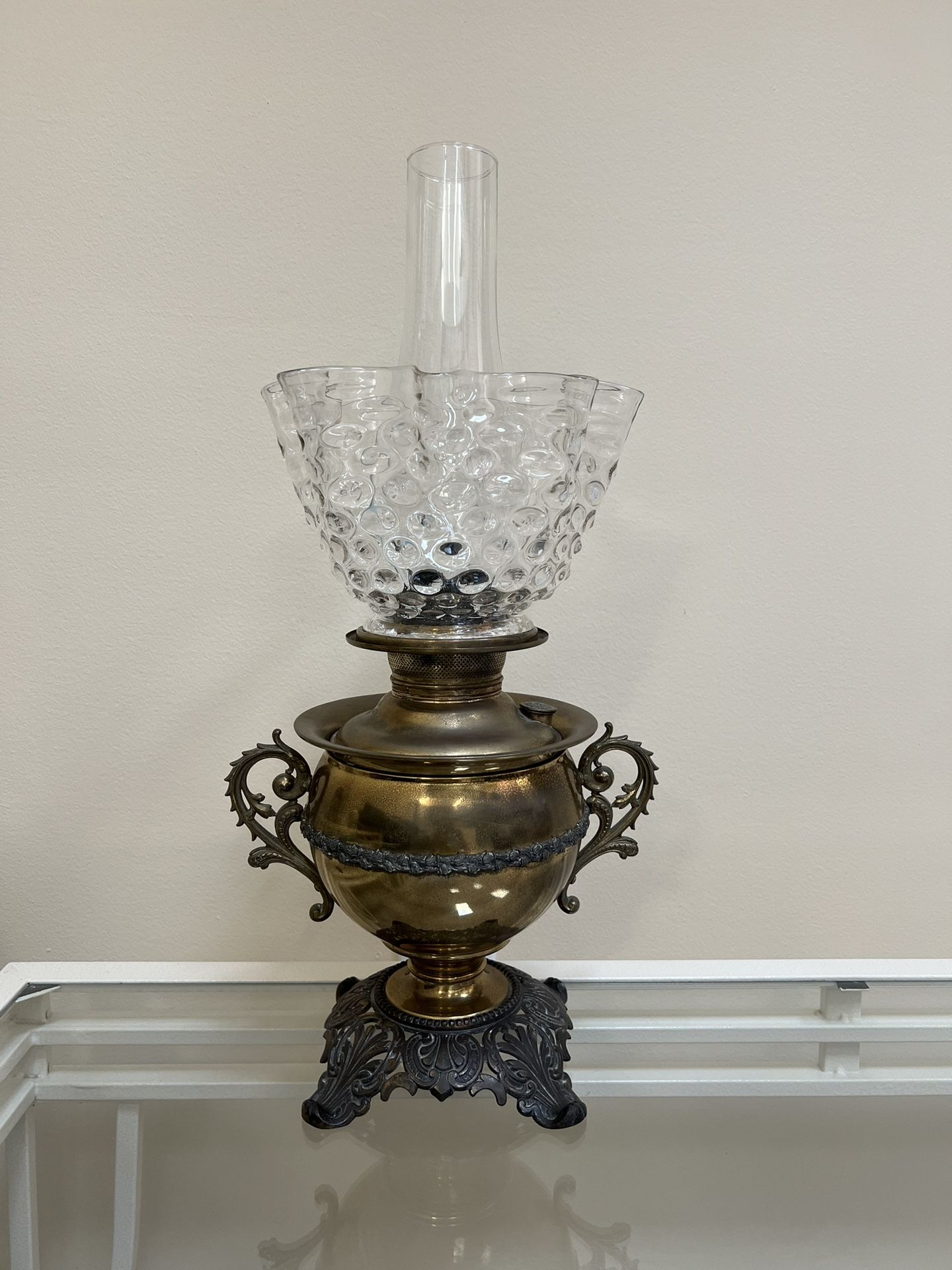 Antique brass oil lamp from early 1900s ("The Juno Lamp")