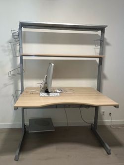 IKEA desk and attached bookcase shelving