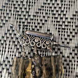 This is a faceted smoky quartz and sterling silver bracelet featuring a box clasp.