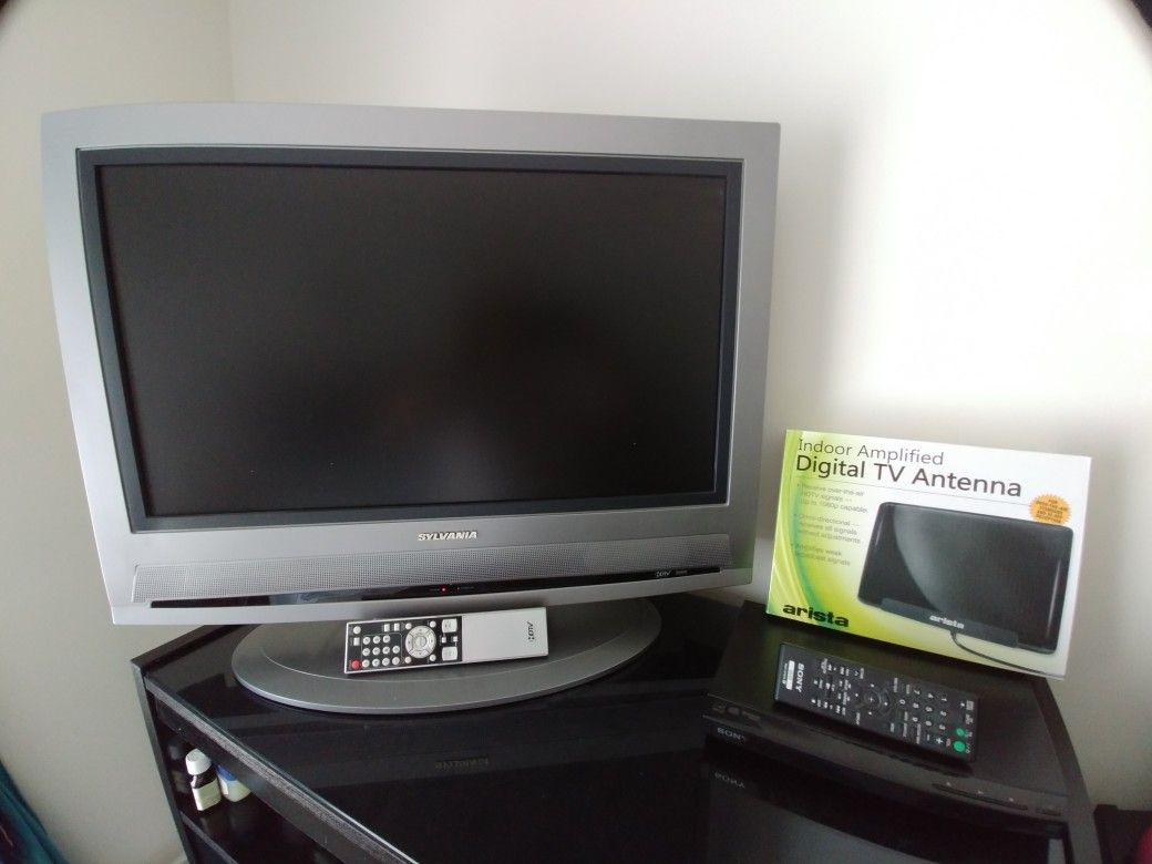27" Sylvania flat screen tv w/remote, Sony DVD player w/remote and HDTV window antenna.