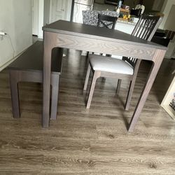 Dining Table With A Bench And One Chair