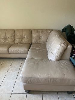 Cream Leather sectional with Foot rest