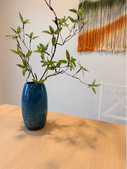 Raku fired blue vase made by Katie