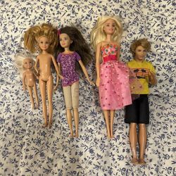 5 Barbie Dolls