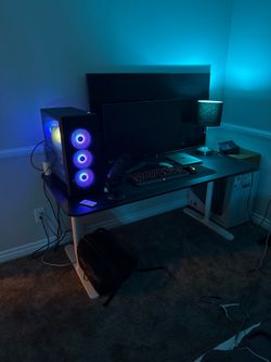 Ibuypower gaming pc and whole yeti mic keyboard  setup with 144hz monitor