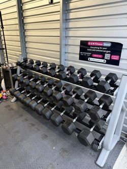 New pair of 10,15,20,25,30,35,40,45,50,55,60,70,80,90,100lb rubber dumbbell with commercial rack. $1945