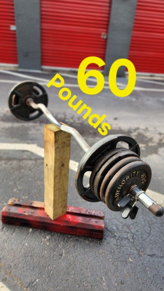 $100 Used Weight Plates 100POUNDS + used Curl Bar. Delivery fee